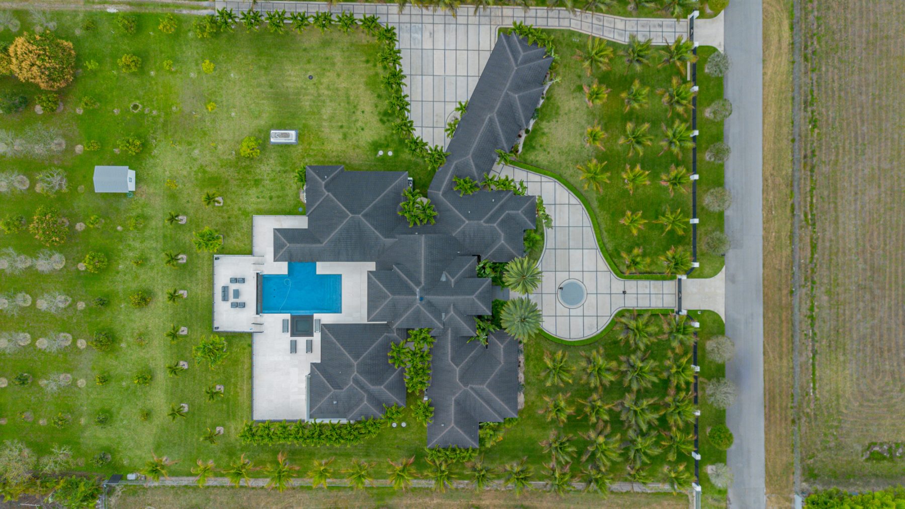 Arrow Estates aerial, pool and rear elevation